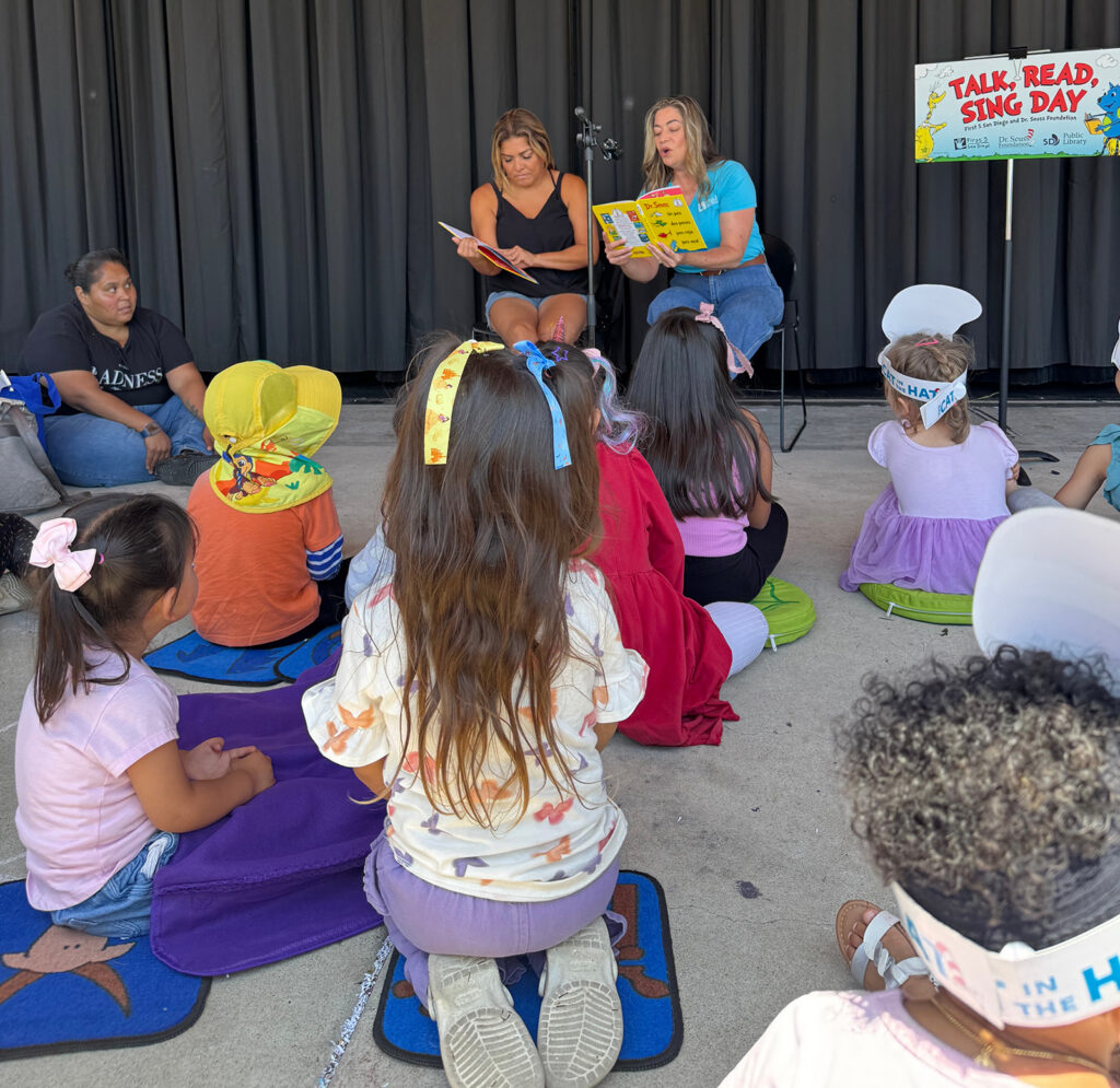 a photo of a talk, read, sing day event
